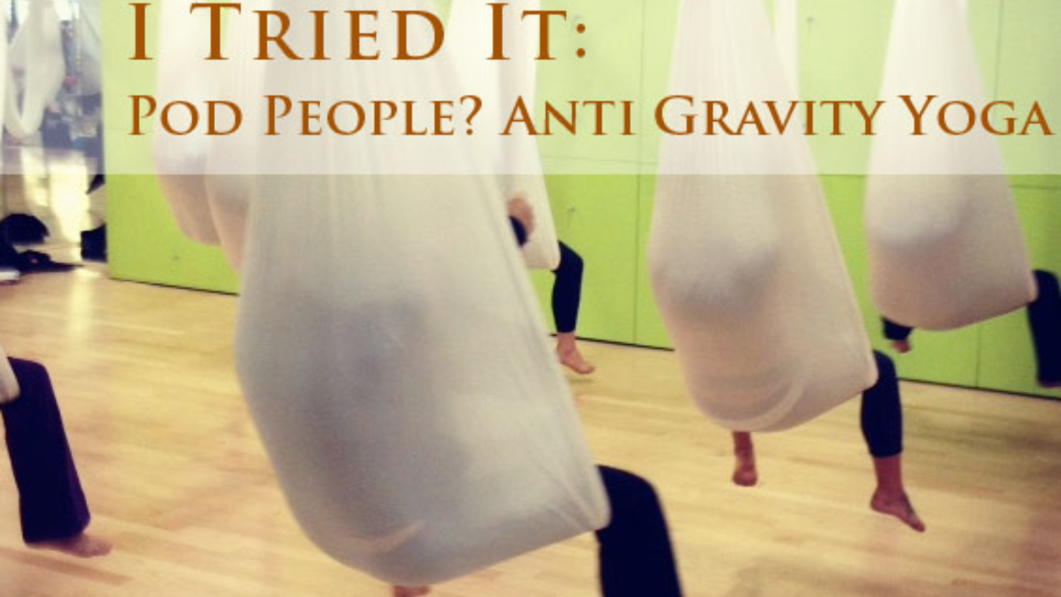 people on anti-gravity yoga