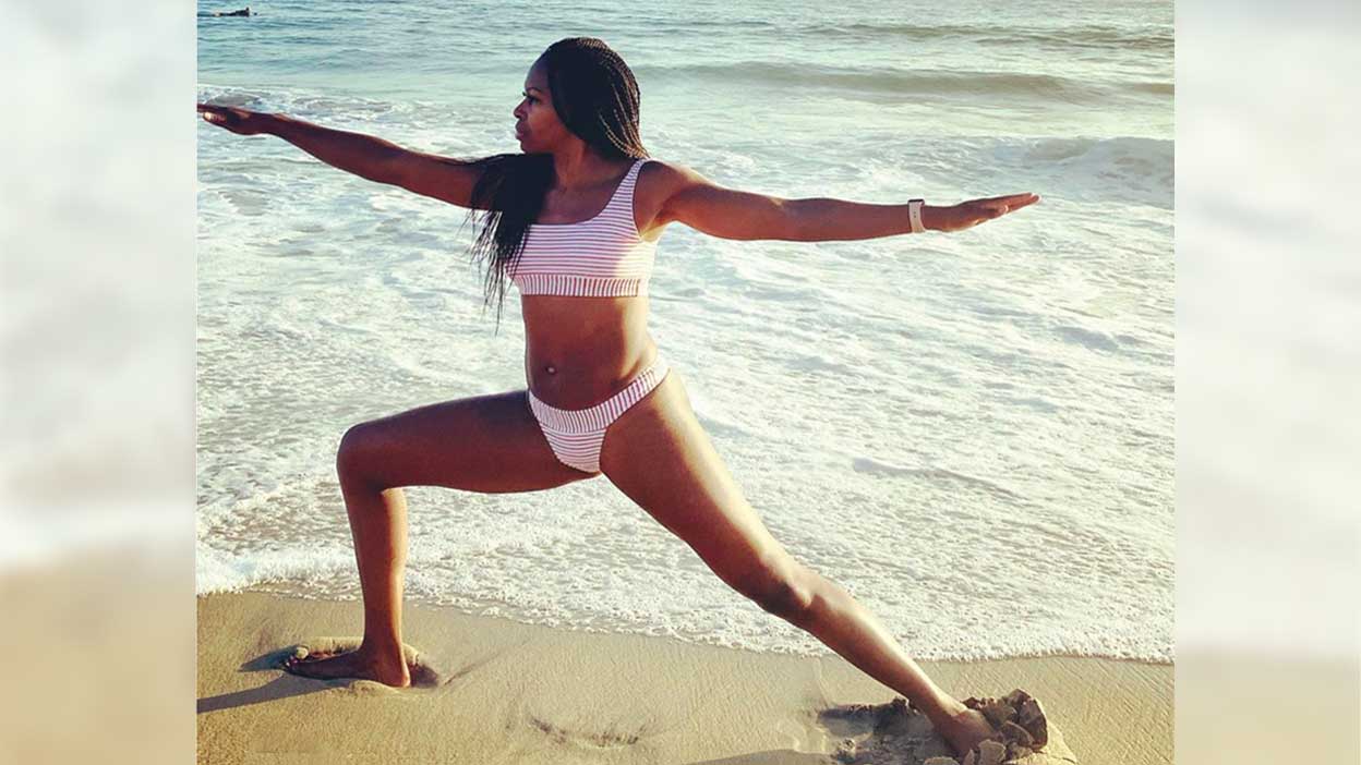 Antoinette Campbell yoga on beach