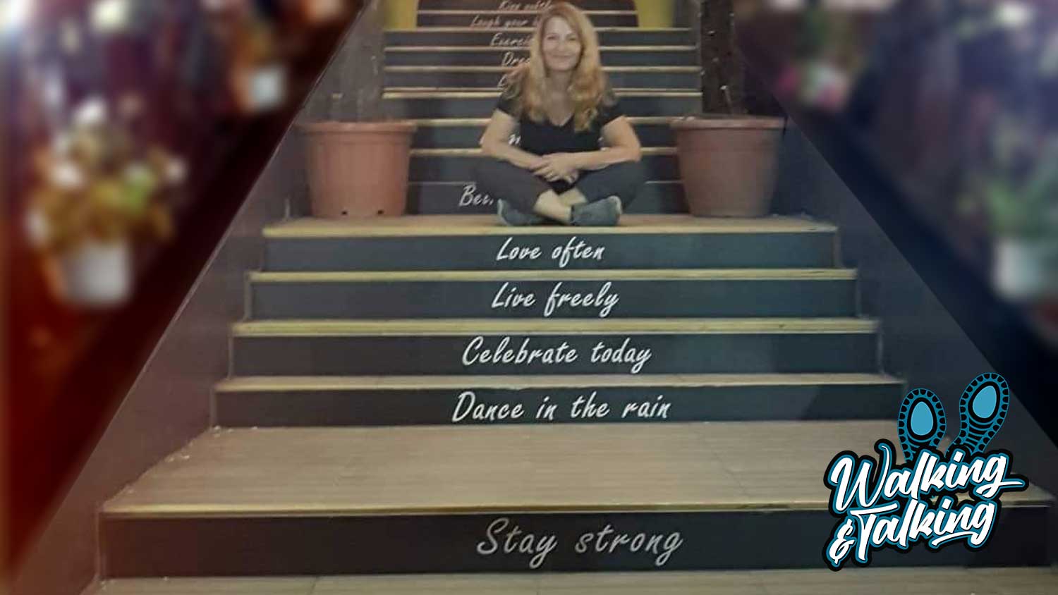 Helen sitting on stairs with positive words