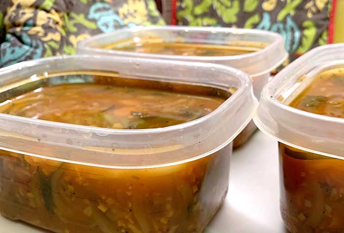 Vegetable soup in containers